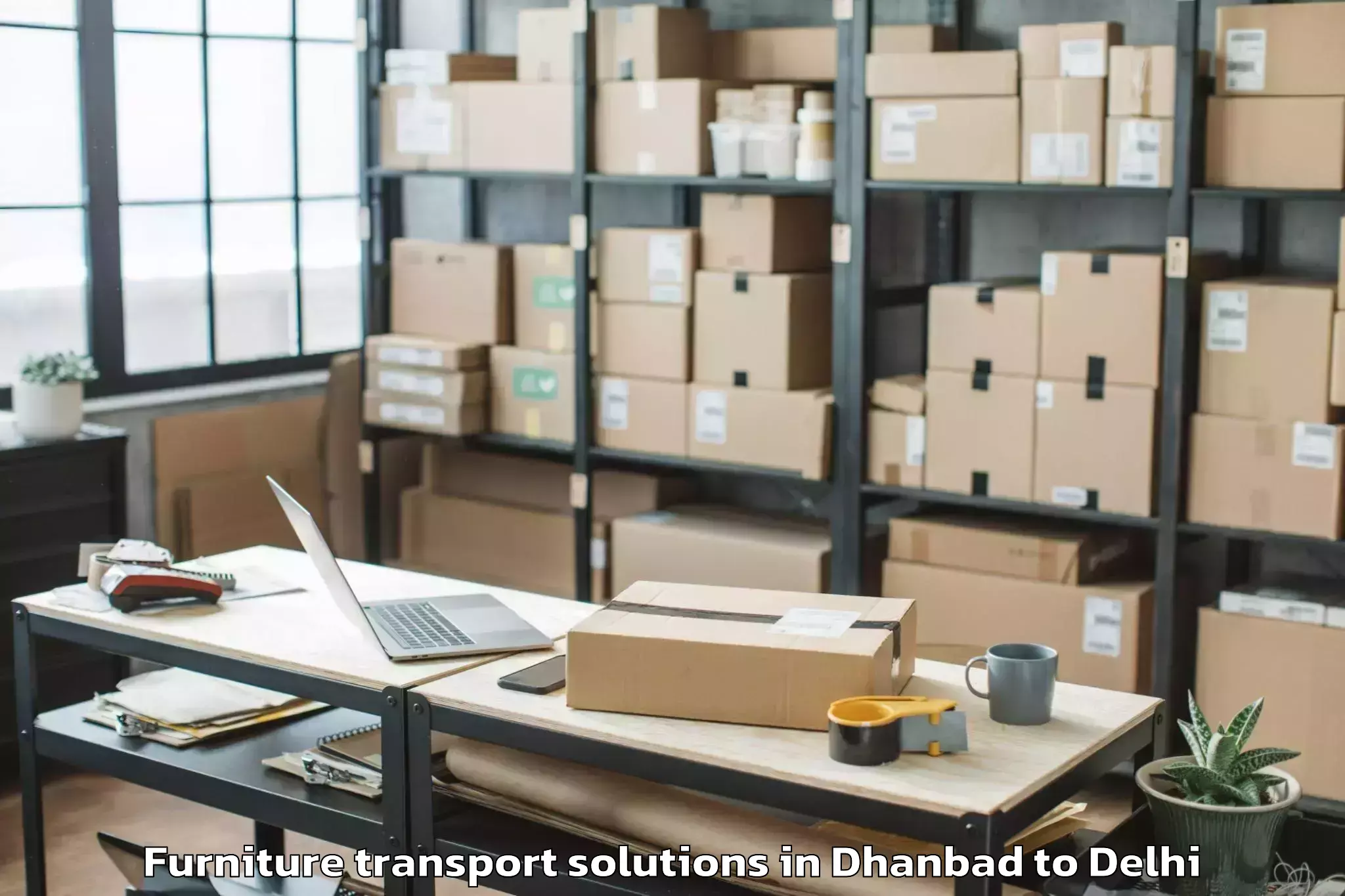 Book Dhanbad to Seema Puri Furniture Transport Solutions